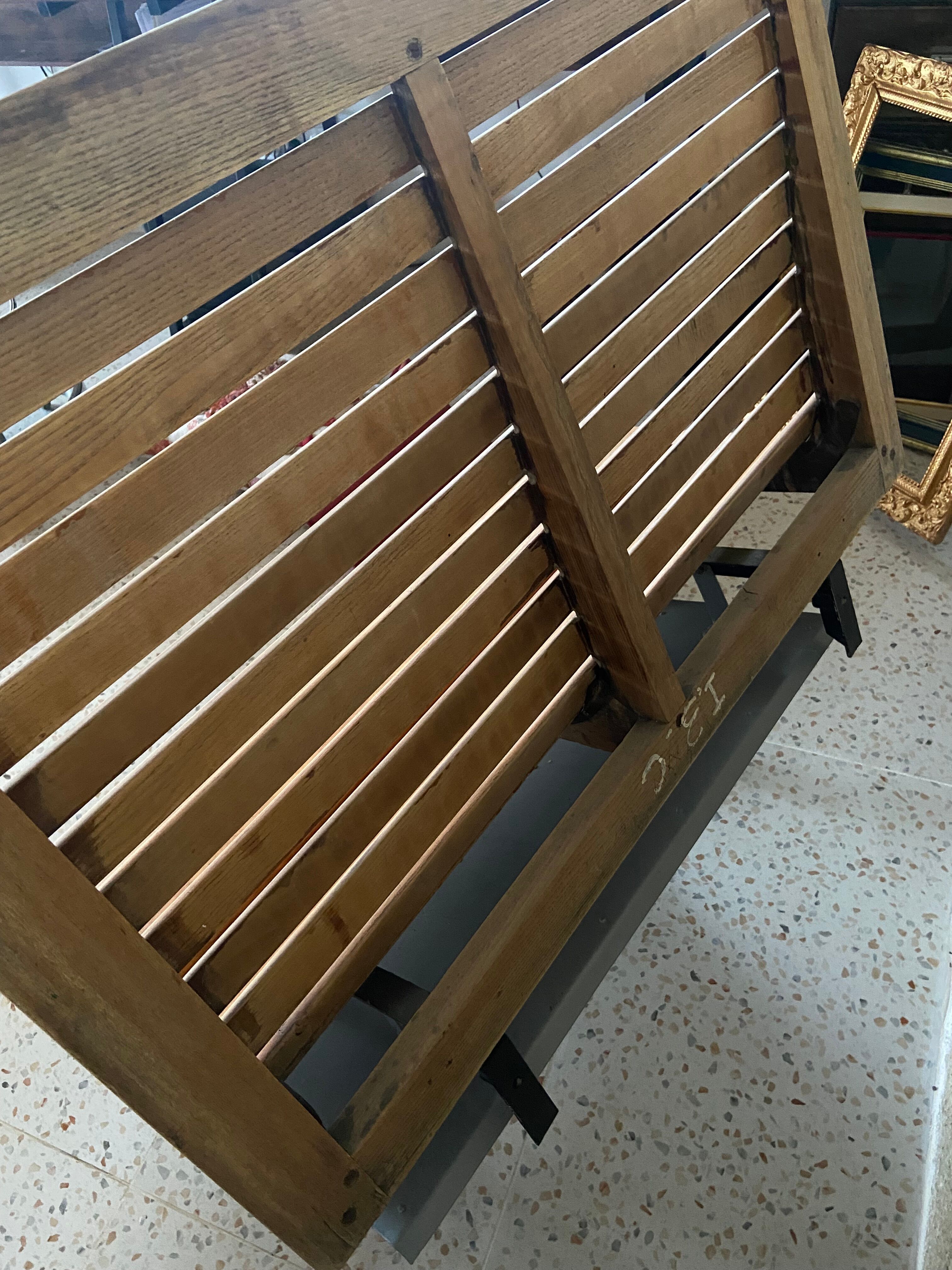 Train bench or metro in wood 1900 with its luggage rack