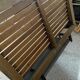 Train bench or metro in wood 1900 with its luggage rack
