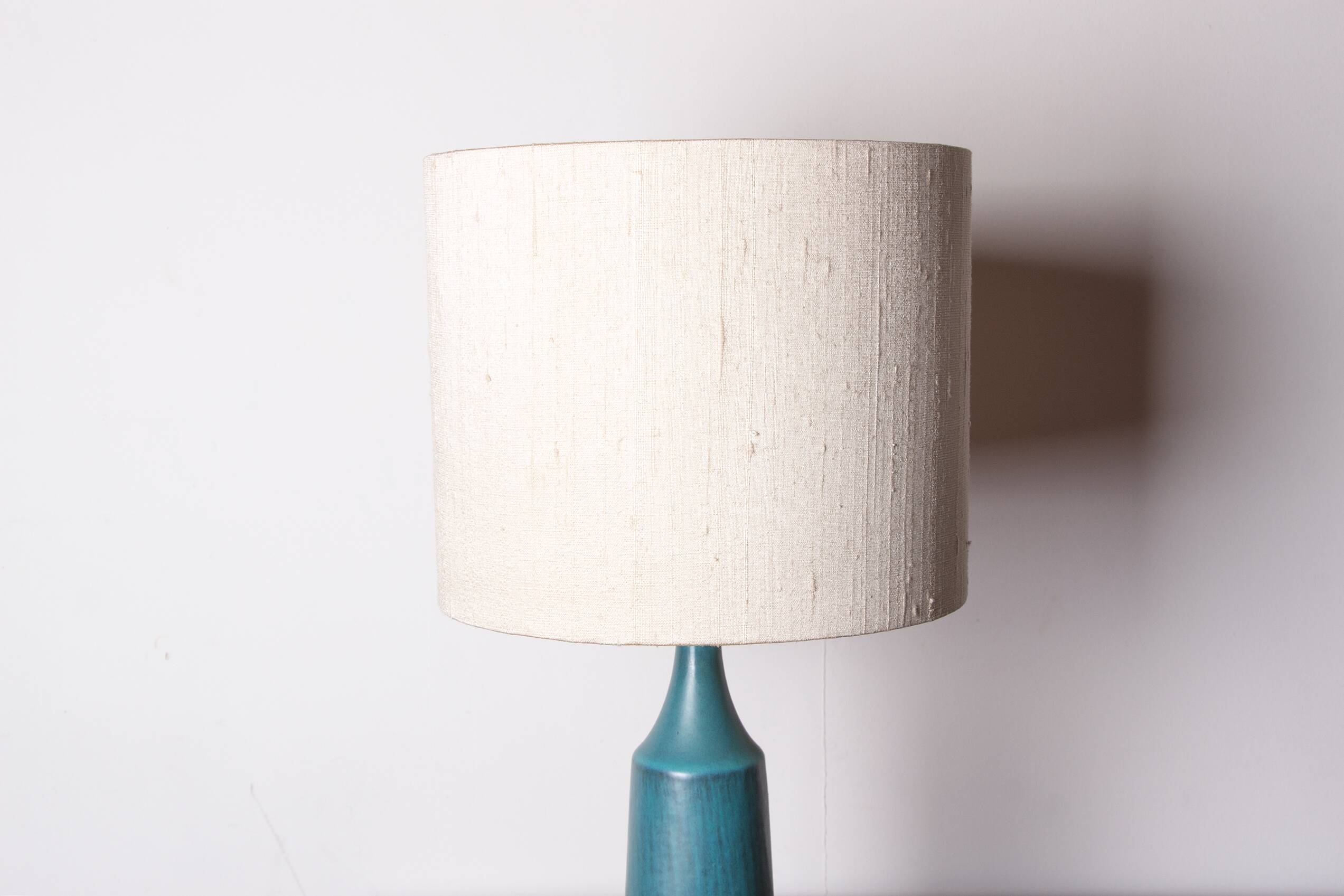Danish truncated conical table lamp in matte blue sandstone by Gunnar Nylund for Nymolle 1960.