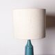 Danish truncated conical table lamp in matte blue sandstone by Gunnar Nylund for Nymolle 1960.