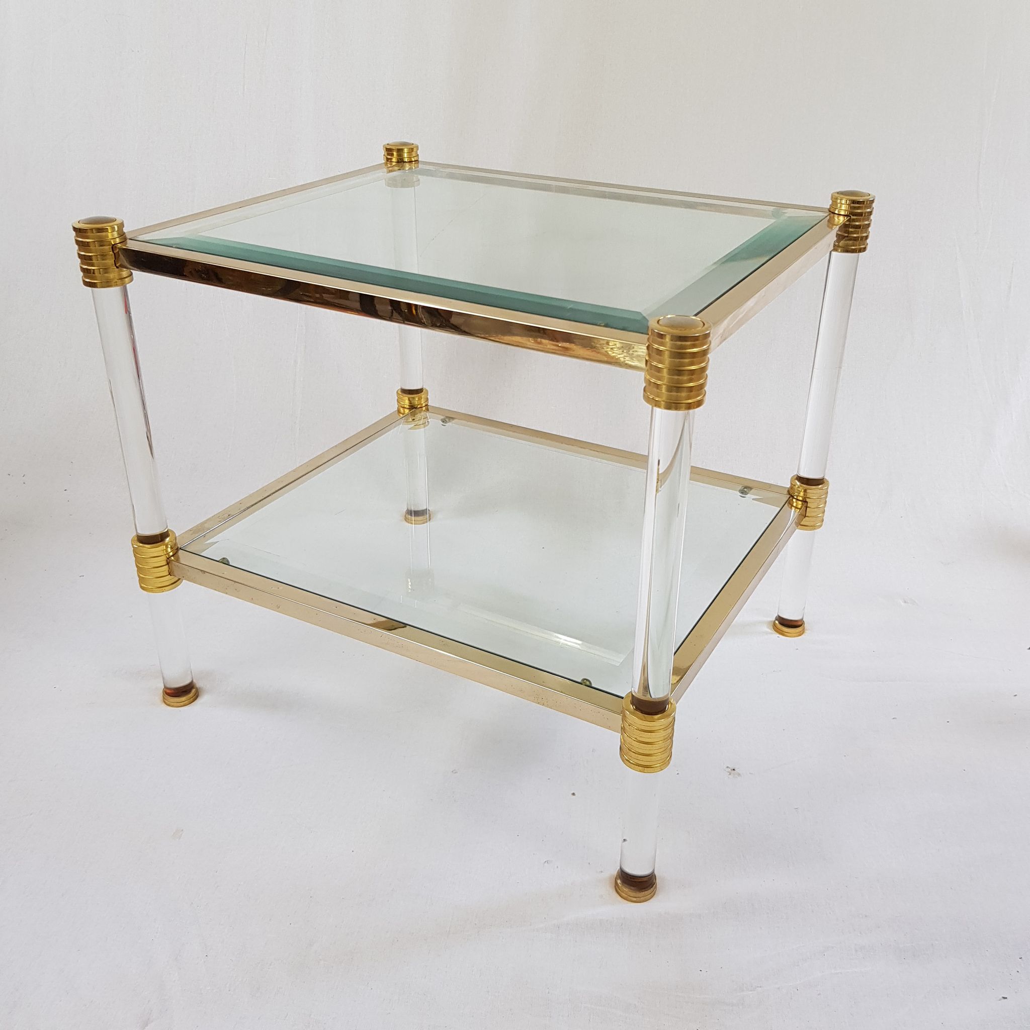 Table basse en lucite et acier doré