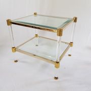 Table basse en lucite et acier doré