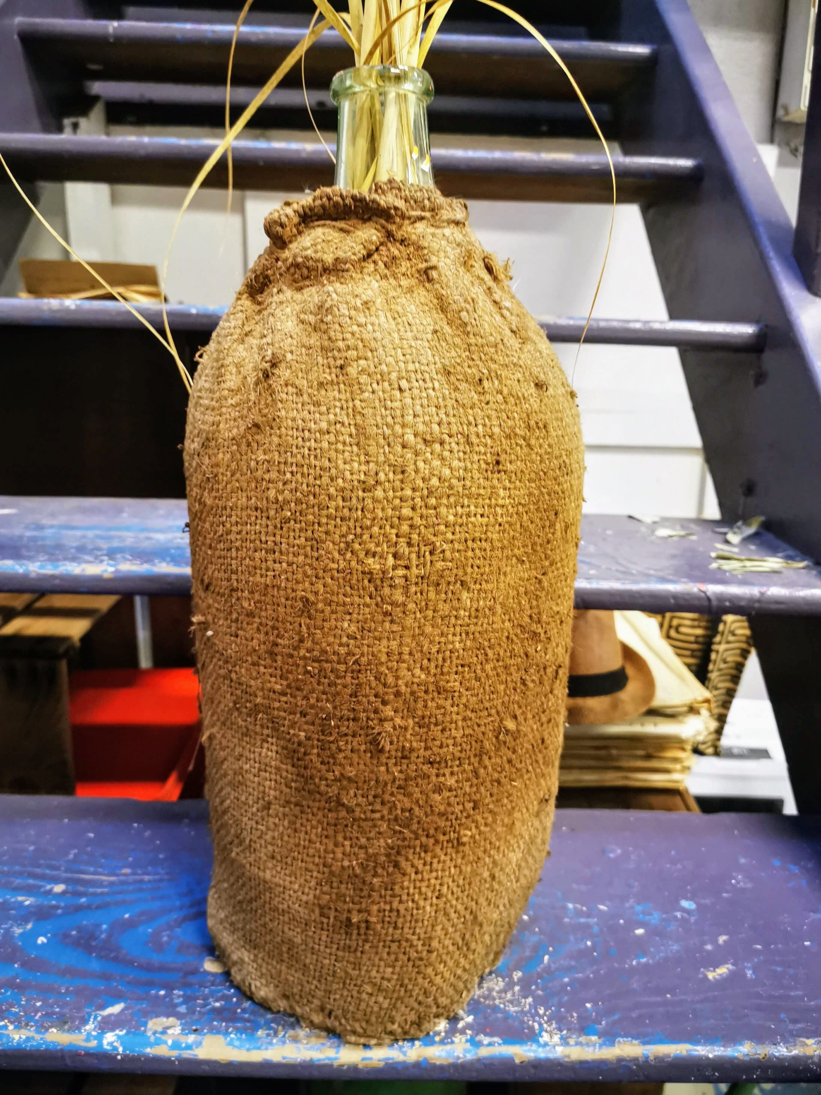 Jute canister dressed in burlap