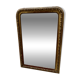 Louis Philippe gadrooned mirror in wood and gilt stucco, 19th century