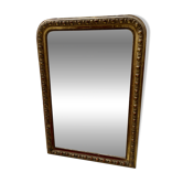 Louis Philippe gadrooned mirror in wood and gilt stucco, 19th century