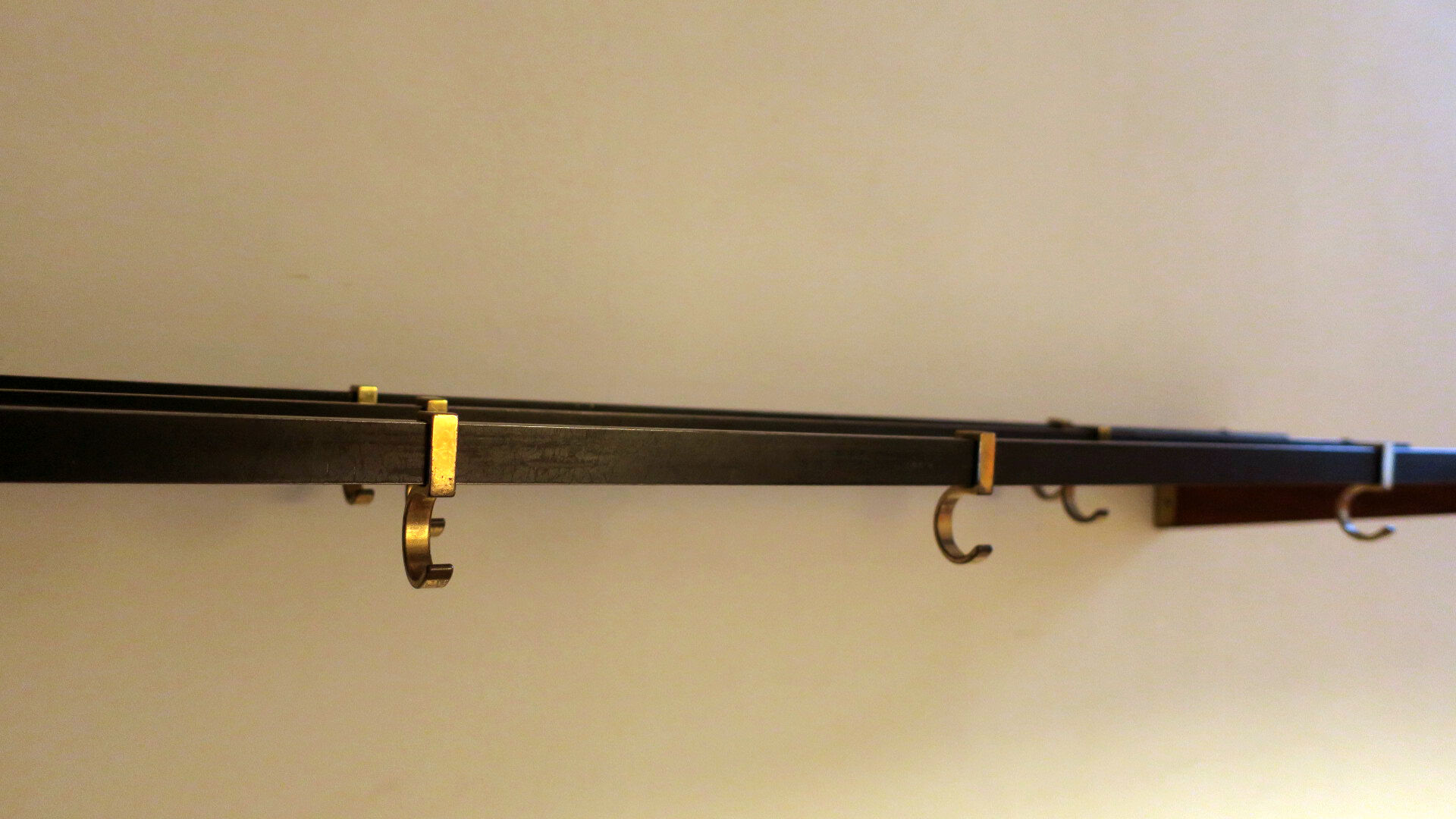 Teak, brass and black metal coat and hat rack, 1960