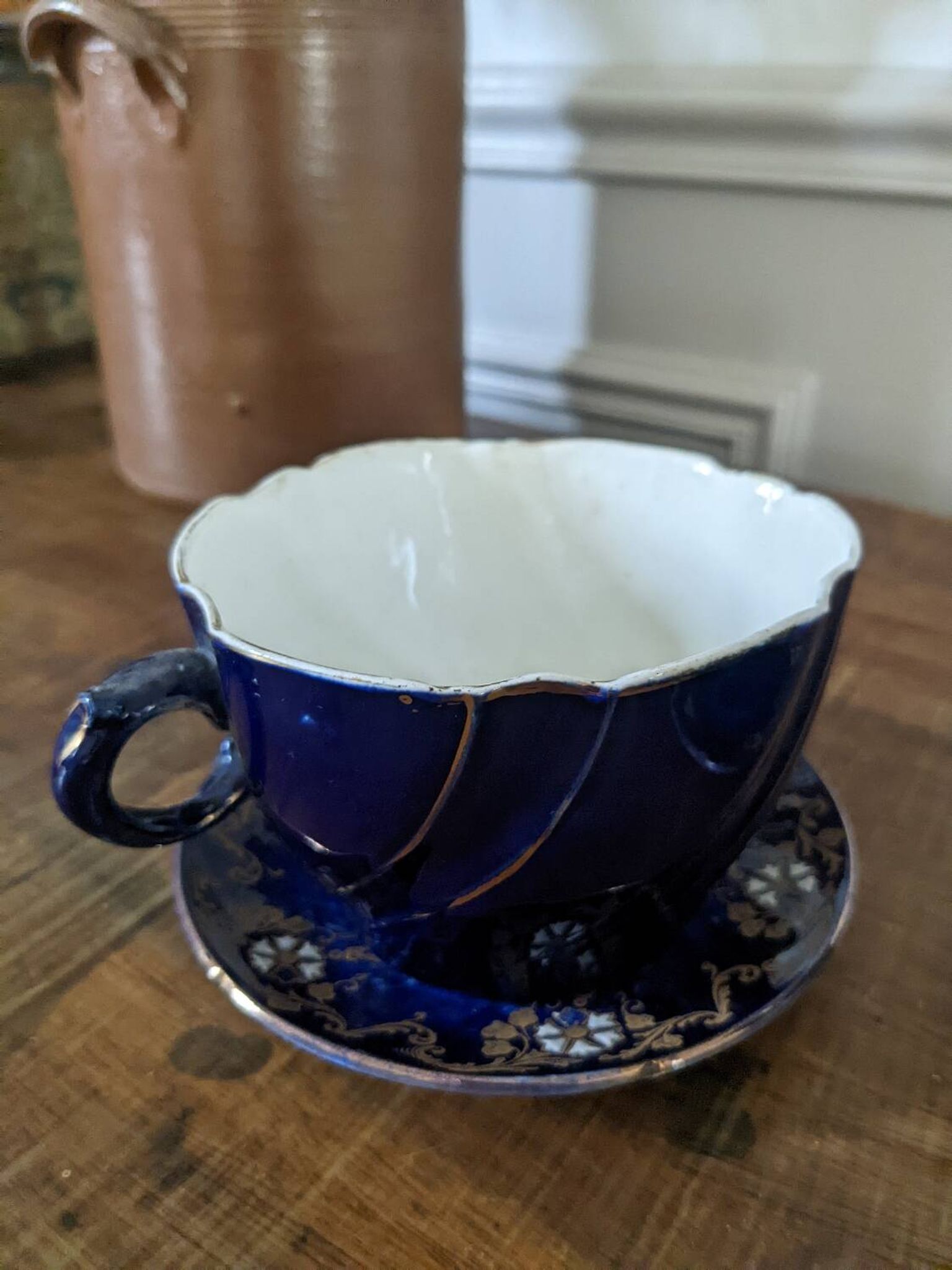 Set of two large Lunéville cups and saucers