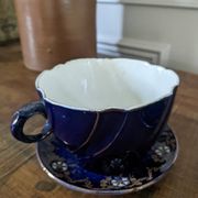 Set of two large Lunéville cups and saucers