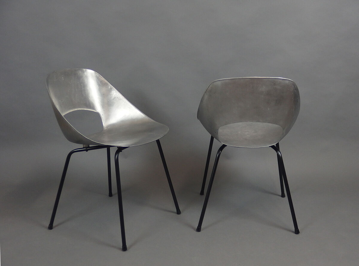 Four aluminium chairs by Pierre Guariche