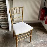 Napoleon III chair in gilded bamboo wood and beige cotton.