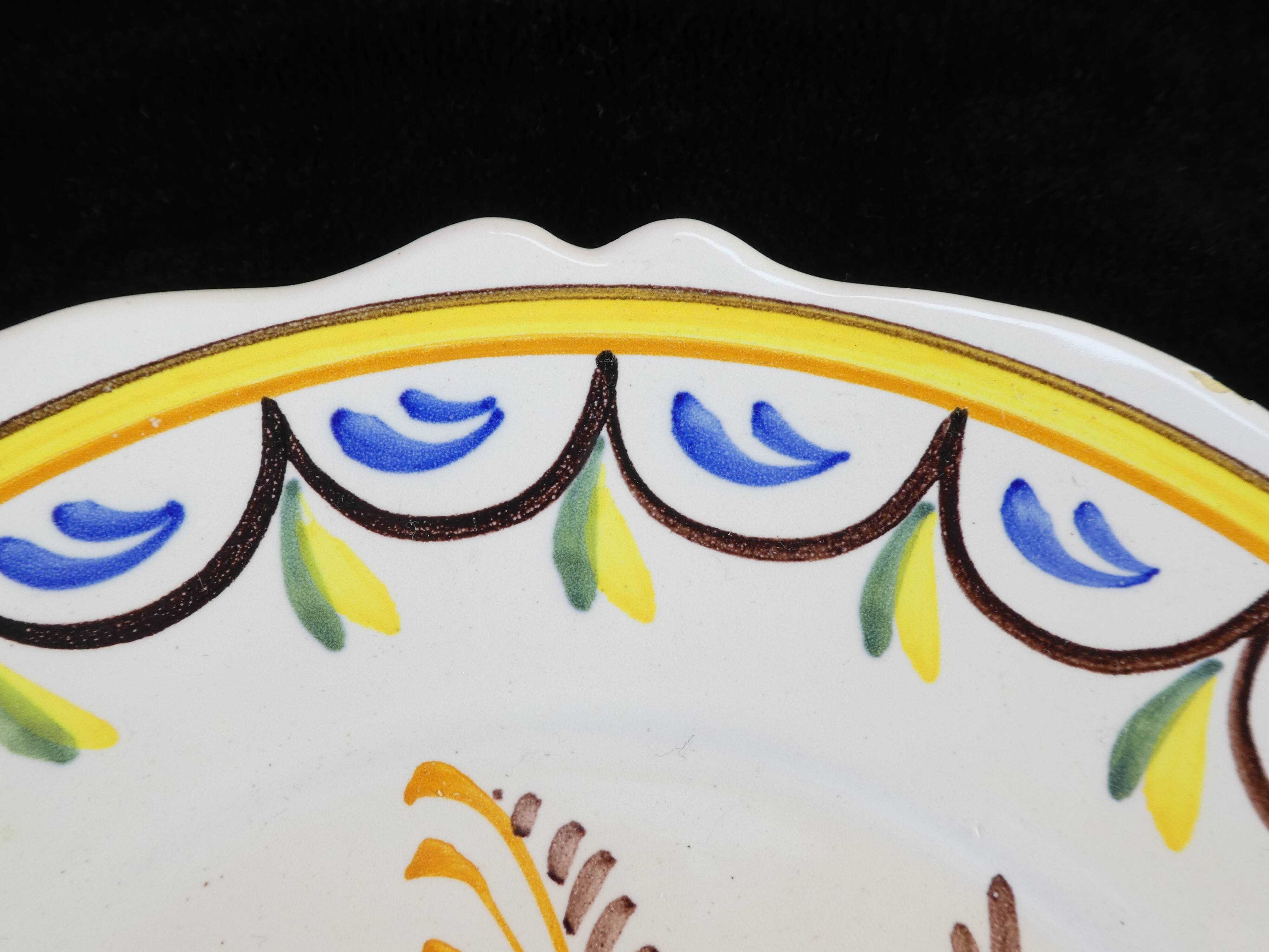 Assiette en faience de Malicorne signé émile Tessier
