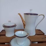 Coffee pot, sugar pot, 1 cup and saucer.