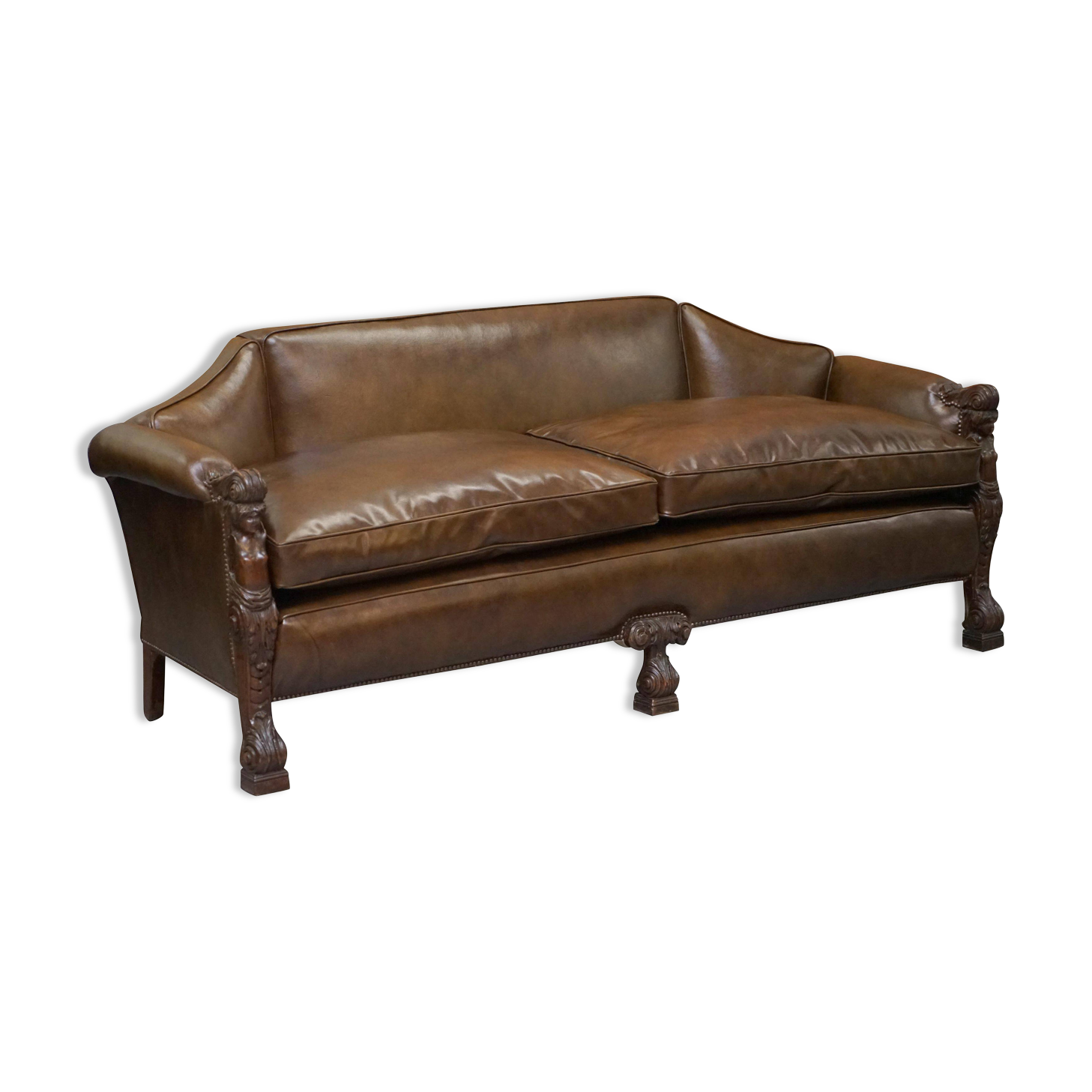 Restored Regency canapé in leather with sculpted Hermès frame.