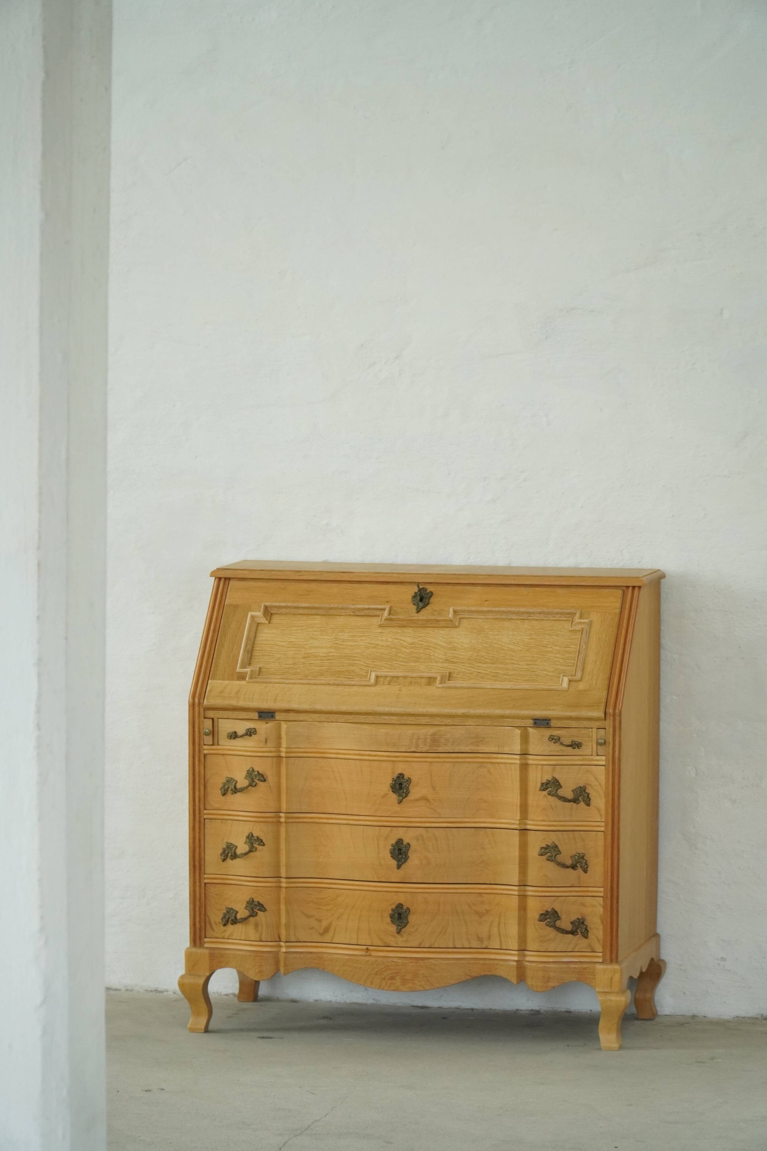 Modern Danish oak secretary with drop-down front, mid-20th century, 1960s.