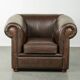 Set of a smooth chesterfield sofa and armchair with a timeless English look