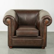 Set of a smooth chesterfield sofa and armchair with a timeless English look