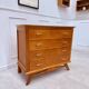 Vintage chest of drawers with tapered legs