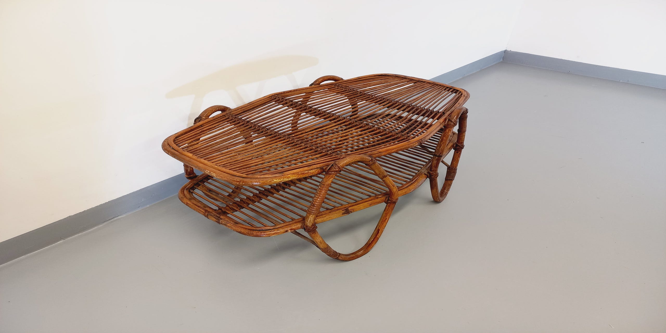 Coffee table with magazine tray in vintage rattan from the 60s