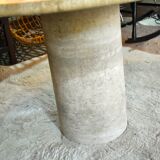Round travertine table