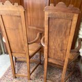 Pair of Renaissance style carved walnut armchairs