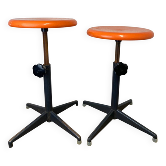 Two vintage industrial stools