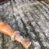Antique farmhouse table in solid cherry wood with turned legs.