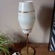 Mid-century gold metal table lamp with white striped shade