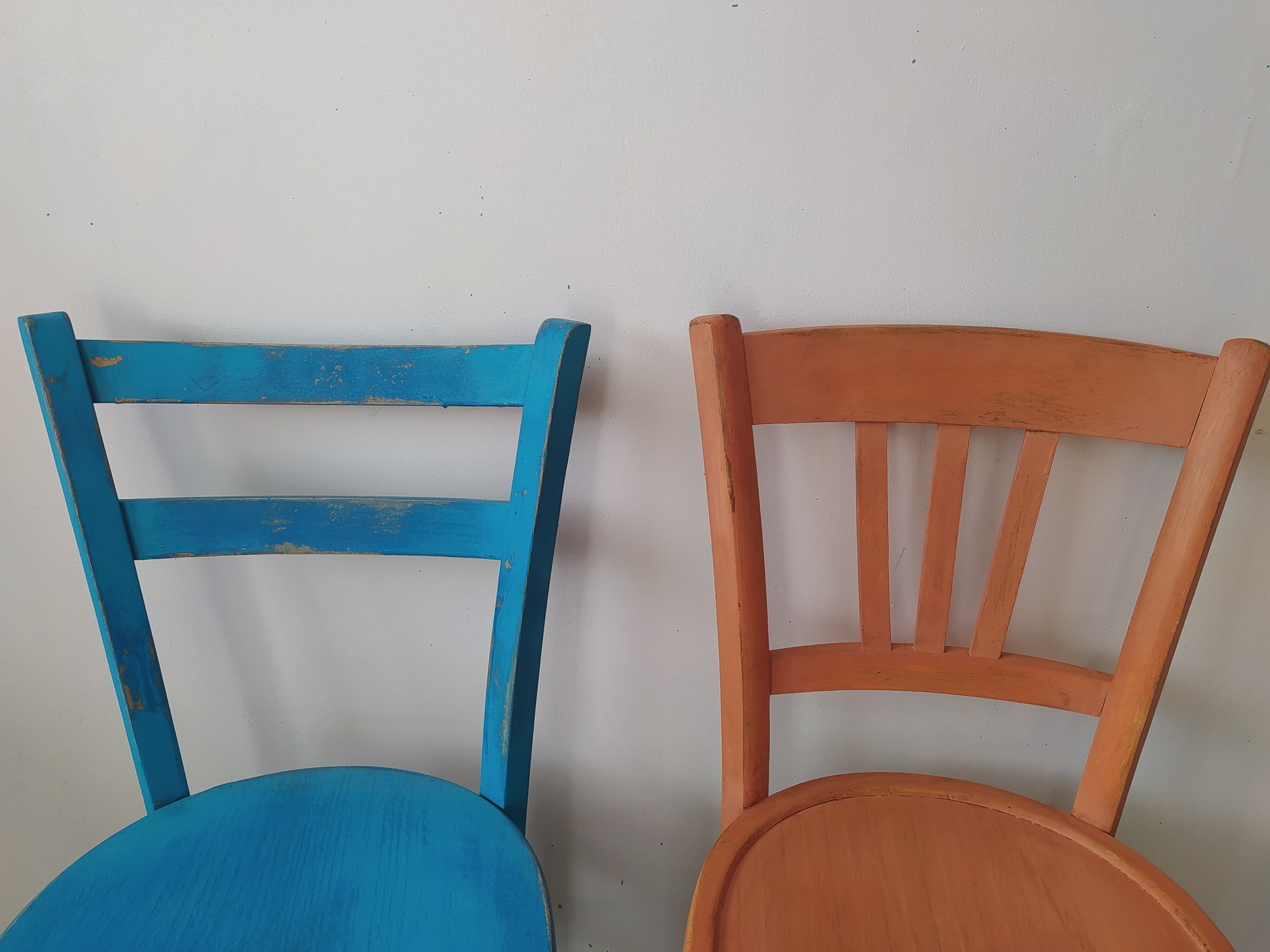 Pair of bistro chairs in patinated wood