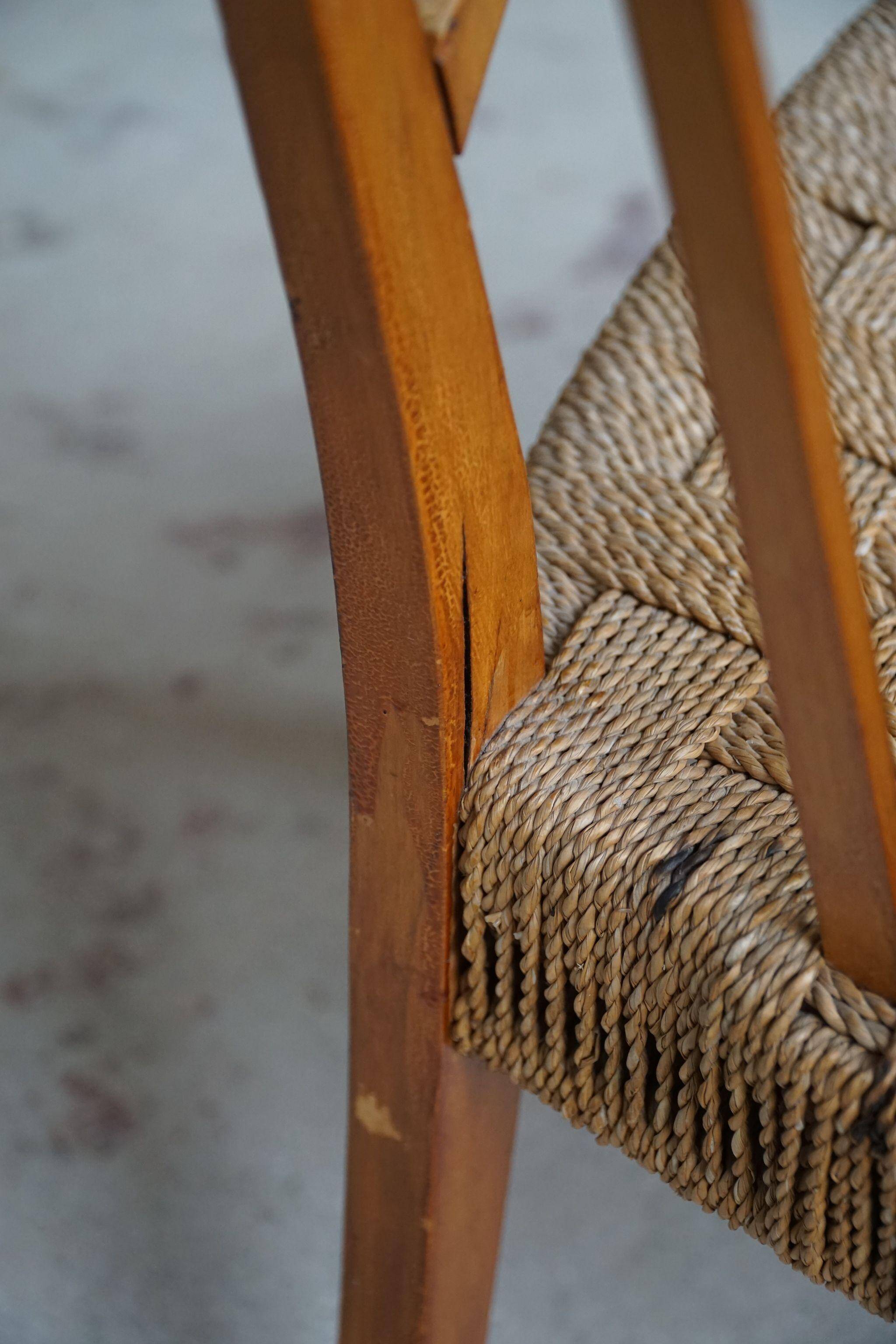 Modern Danish lounge chair in beech and paper cord, in the style of Frits Schlegel.