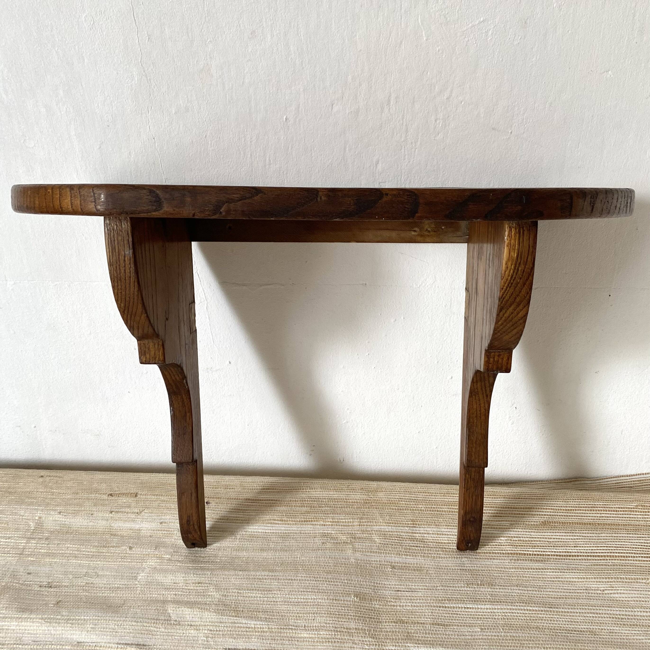 Rustic wooden wall shelf