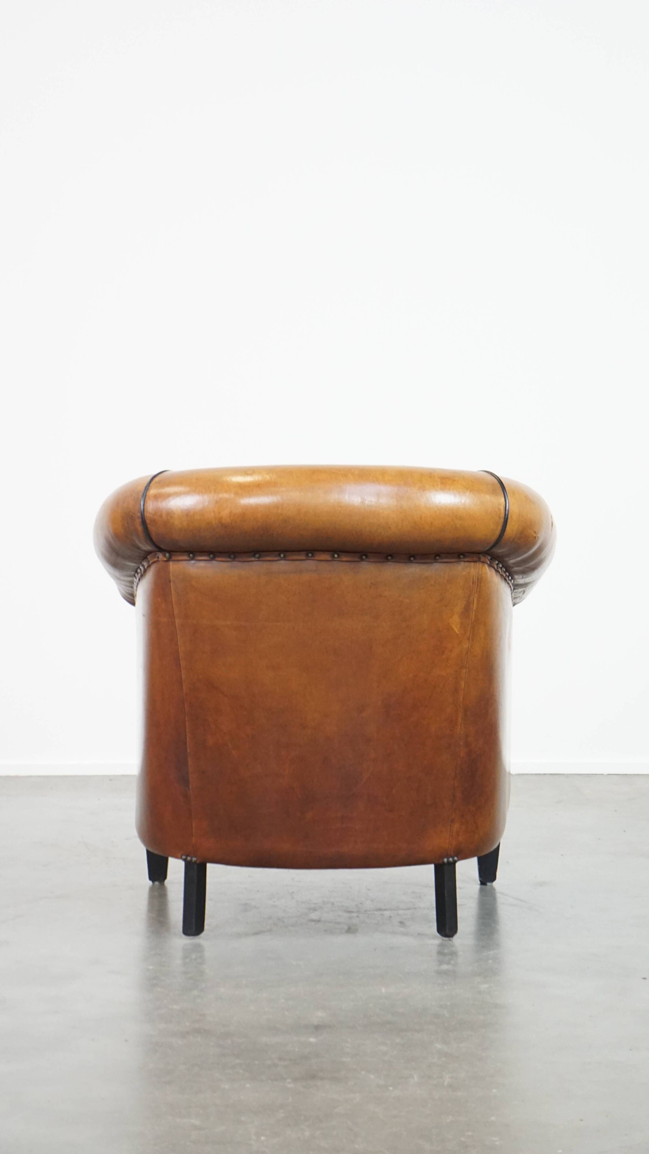 Sheep leather club chair with patina