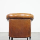 Sheep leather club chair with patina