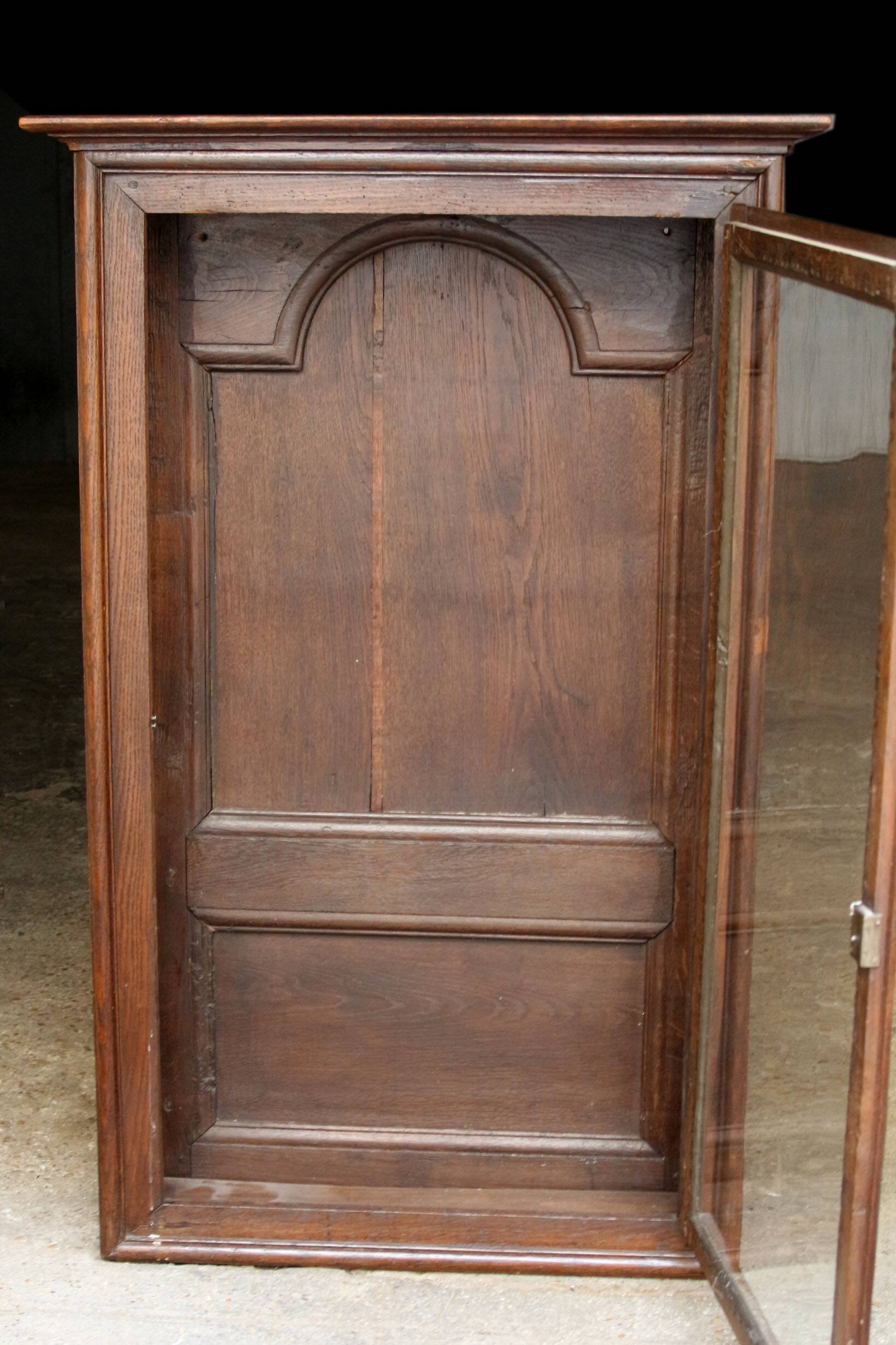 Elegant 18th century solid oak display cabinet.