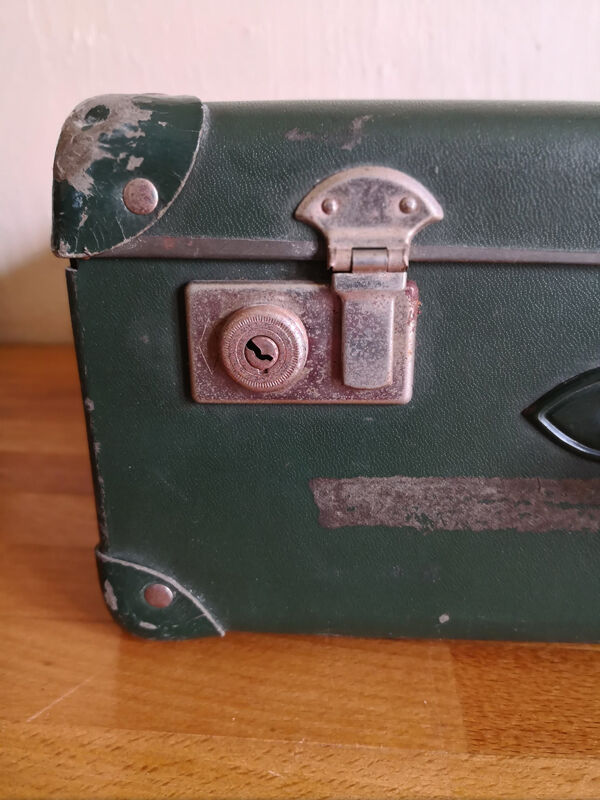 Small green suitcase