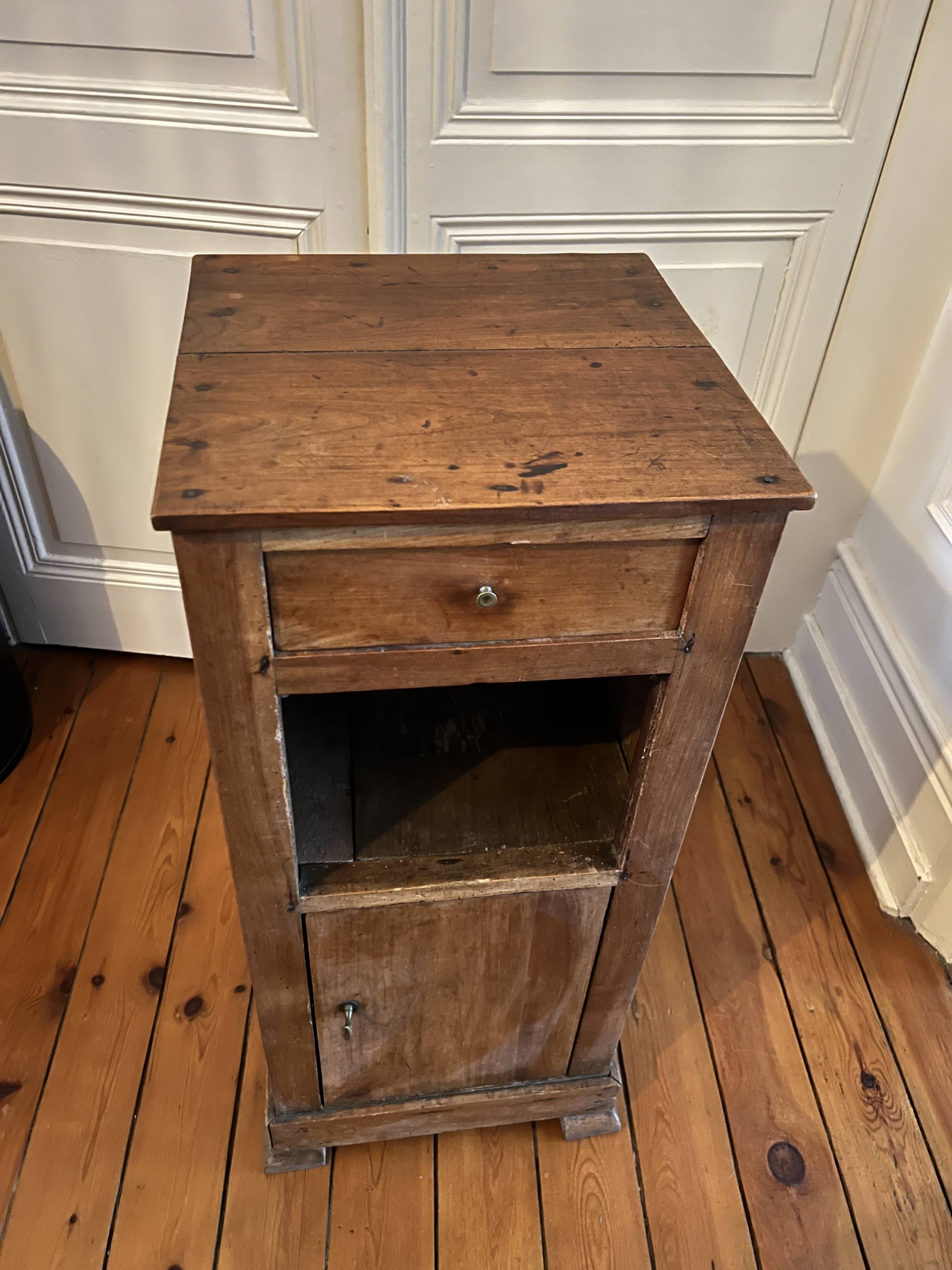 Old wooden bedside table