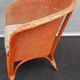 Fauteuil anglais Lloyd Loom kapok orange et vert