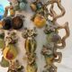 Large antique vase with relief decorations of coloured fruits.