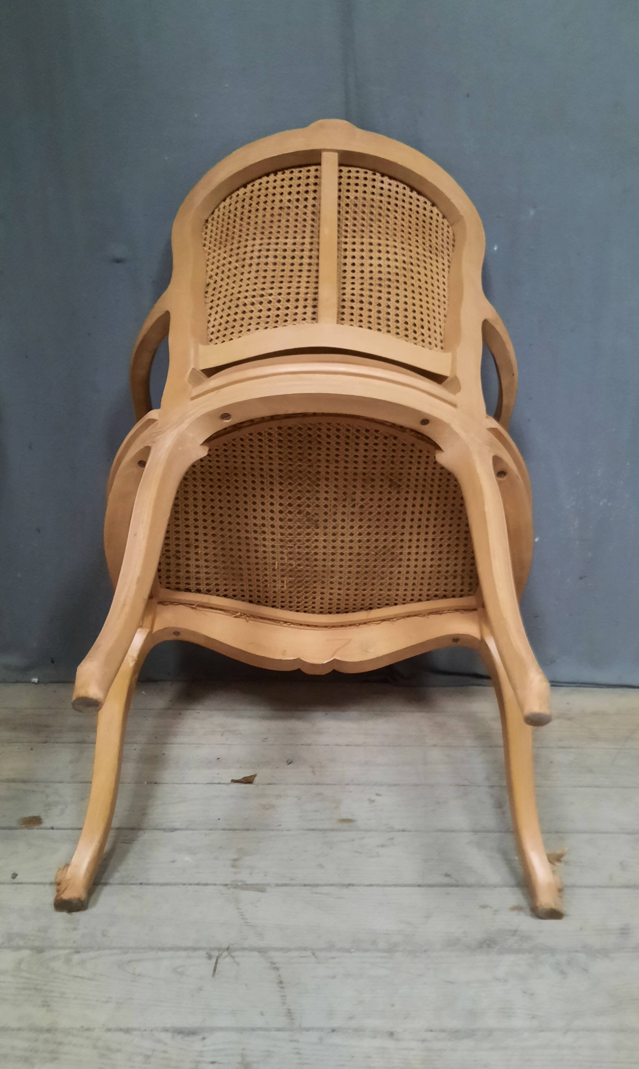 Louis XVI style caned armchair