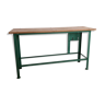 Industrial workbench in green metal tray being massive
