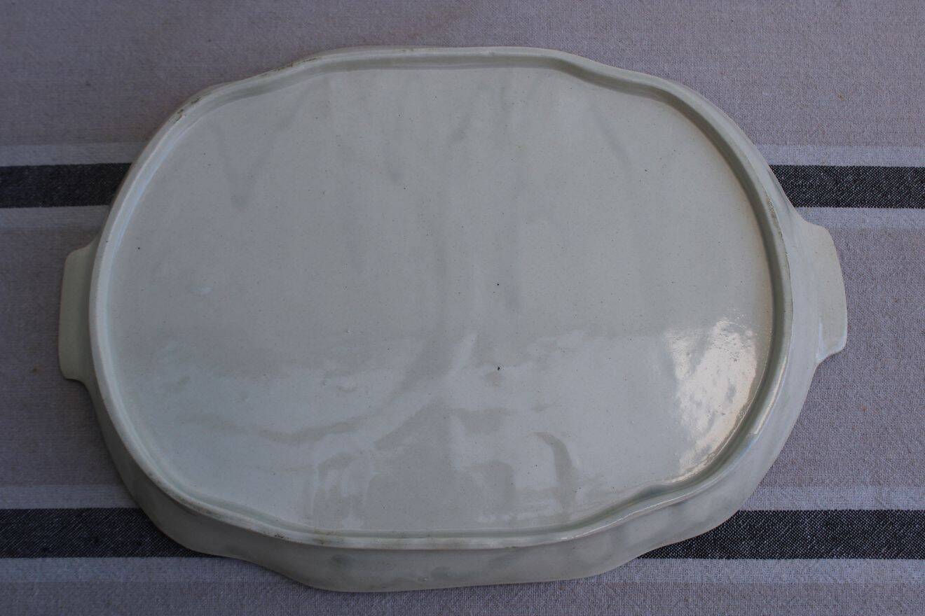 Ceramic cheese board