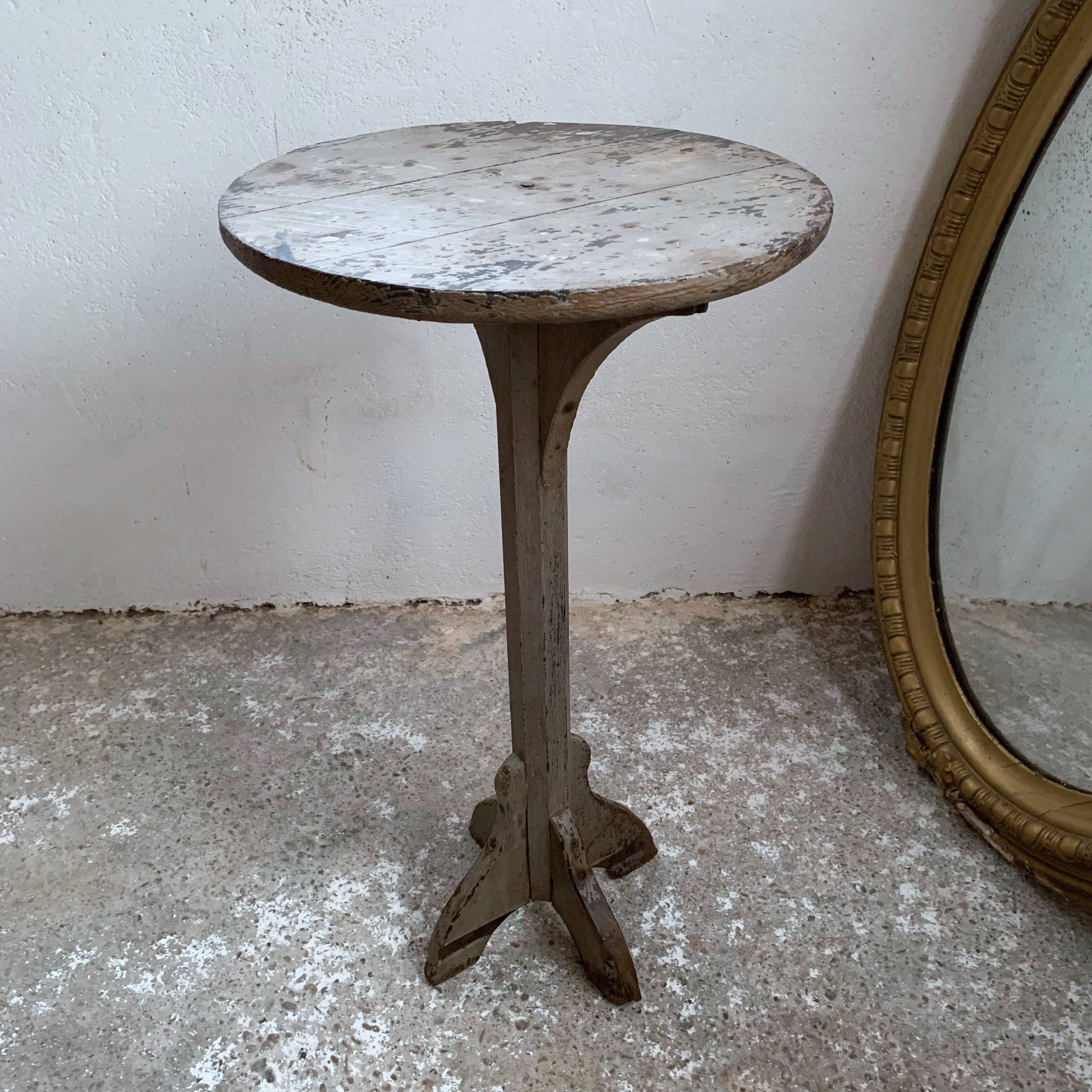 wooden pedestal or primitive winemaker's table