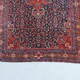 Tapis persan noué main des années 50