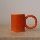 Handmade orange peach ceramic coffee mug set with large circular handles