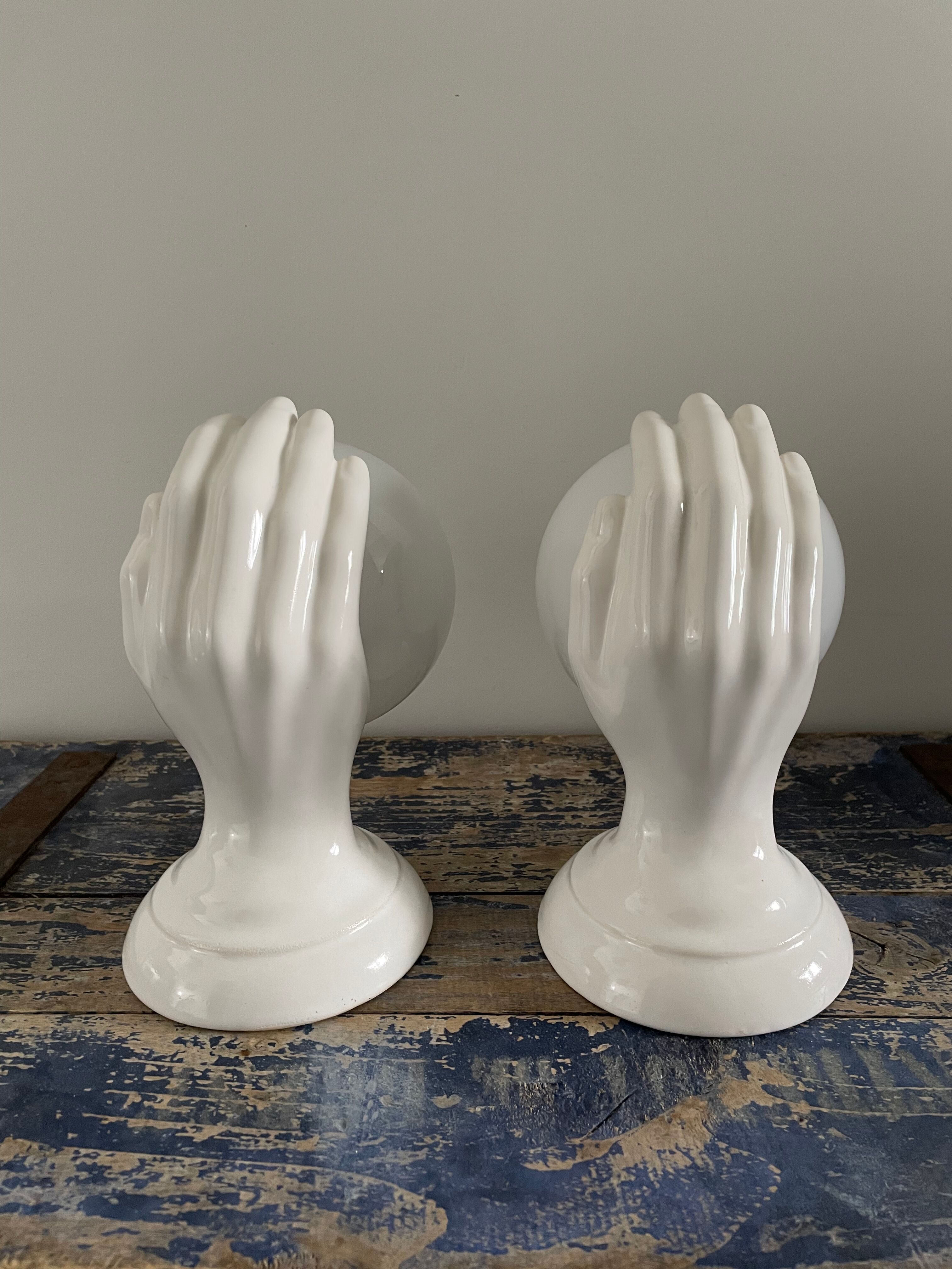 Set of two white ceramic hand sconces