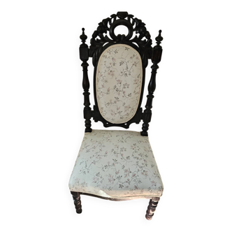 Antique chair known as "nurse's chair"