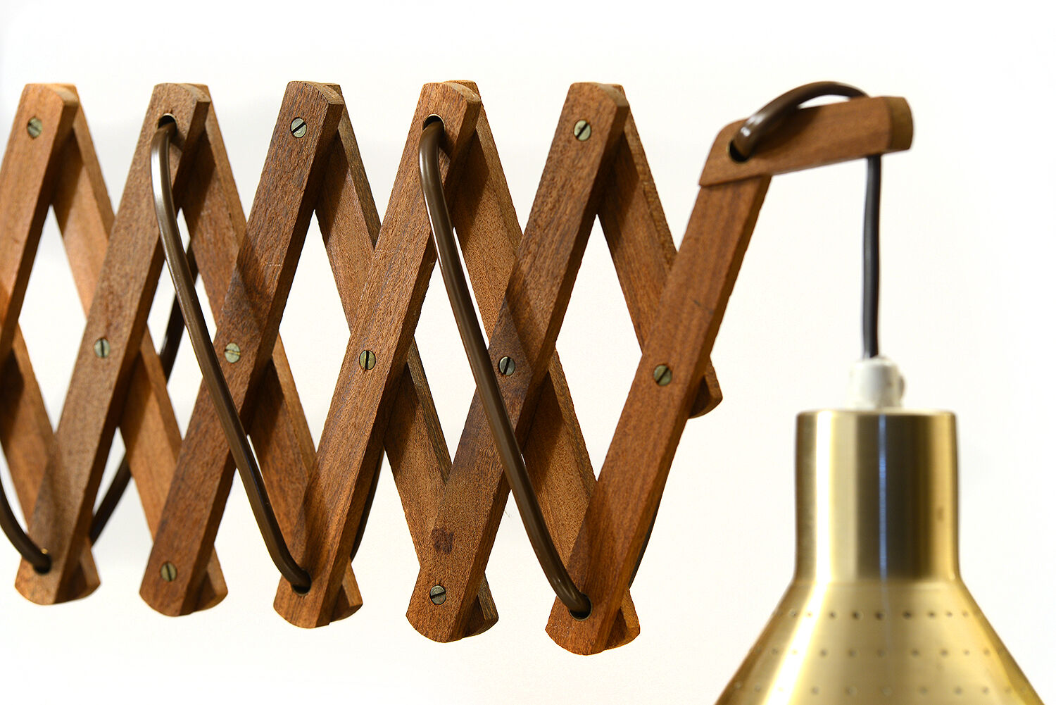 Solid teak wall lamp/Scissor lamp with brass coloured aluminium shade.