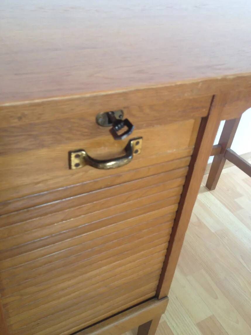 Vintage 1950s oak desk with sliding curtain.
