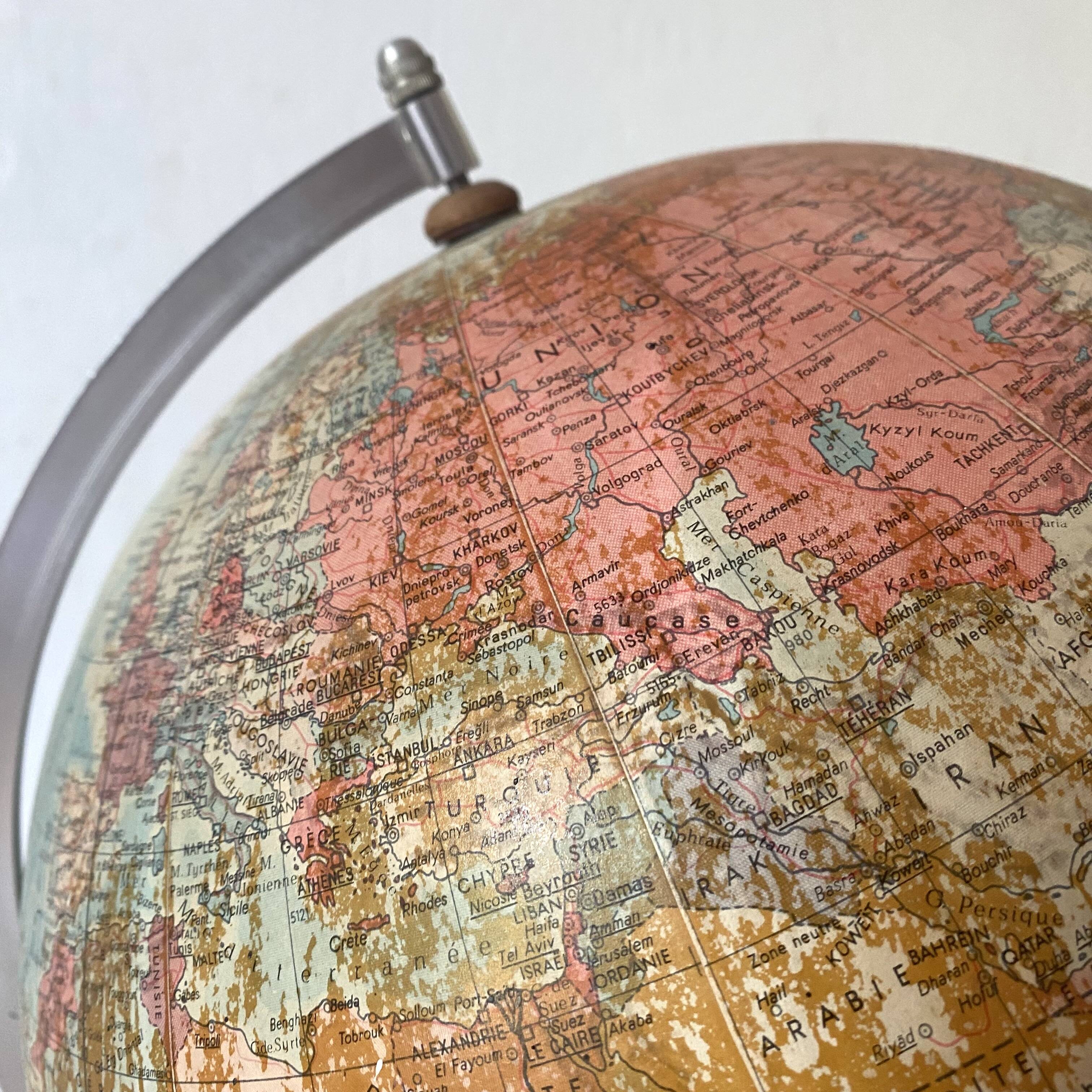 Old terrestrial globe with wooden base H46 cm