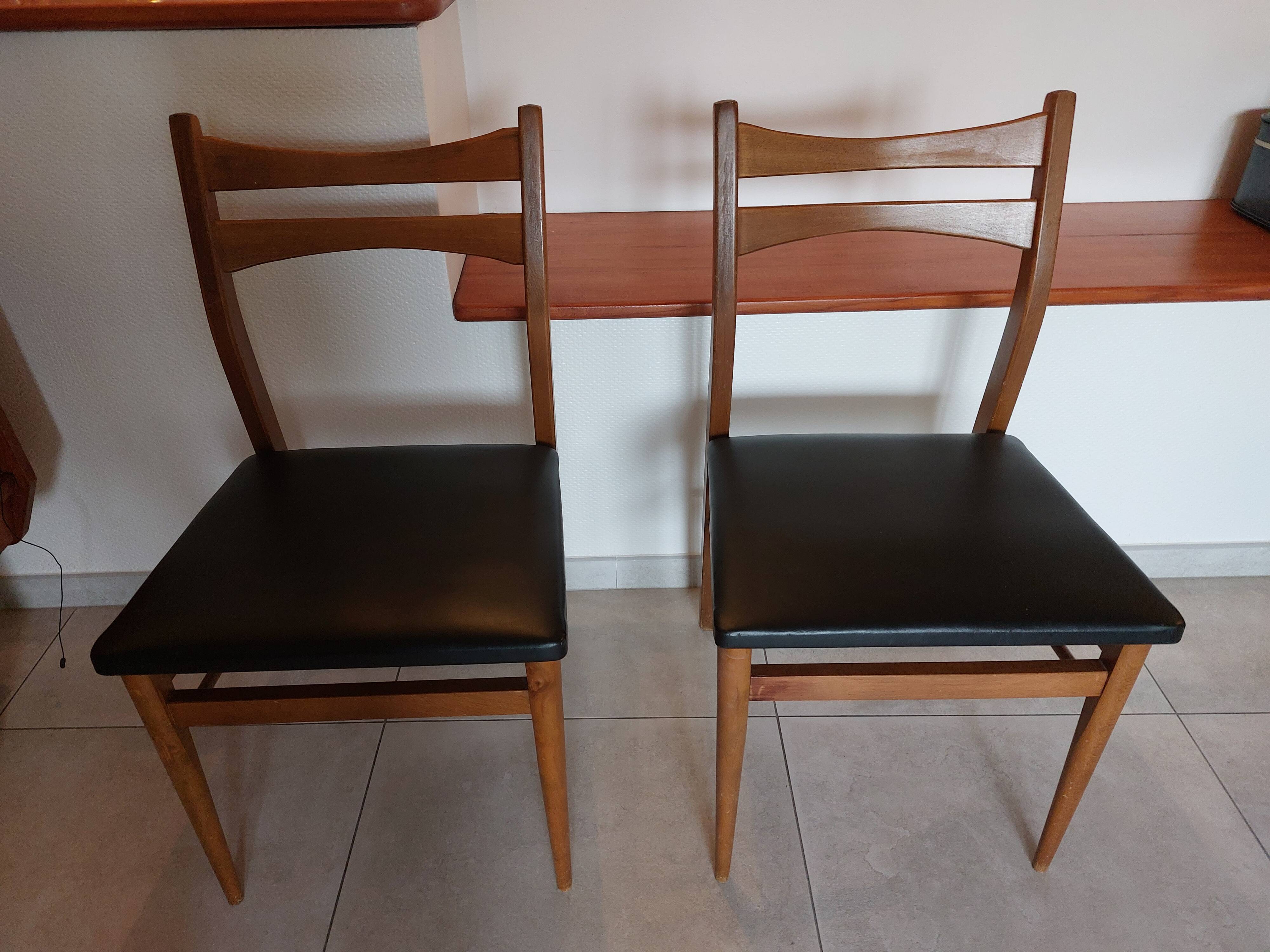 5 Scandinavian style chairs, wood and black faux leather.