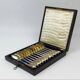 12 dessert spoons in vermeil, Minerva 19th century, blackened pear tree box